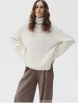 Loose Fit Turtleneck Sweater Solid Color Knitted Split Hem Autumn Winter Womens Fashion Wholesal