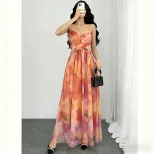 Orange Floral Print Maxi Dress Elegant Sleeveless Design Perfect for Beach Vacations Wholesale A
