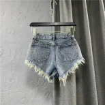 欧美女装修身破洞露口袋流苏毛边怀旧色牛仔短裤性感低腰A字热裤