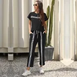 Two Piece Striped Casual Set Short Sleeve Round Neck Trendy Design Perfect for Summer Outings Wholesale Availabl