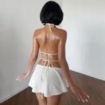 ins欧美女装2026夏季新款海边度假风性感辣妹镂空串珠挂脖连衣裙