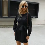 Black Long Sleeve Bodycon Dress with Tie Detail Elegant Vintage Style Perfect for Parties and Ev