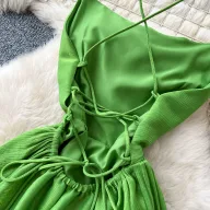 Green Backless Maxi Dress for Women with Waist Cinching Design and Flared Skirt Ideal for Summer Vacations Wholesale