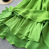 Green Backless Maxi Dress for Women with Waist Cinching Design and Flared Skirt Ideal for Summer Vacations Wholesale
