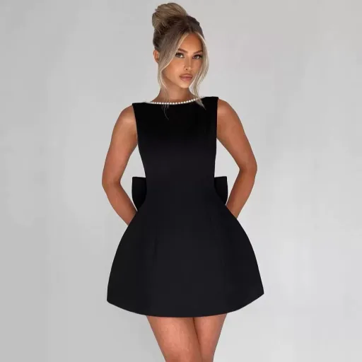 Fashionable Womens A Line Dress with Pearl Bow Detail Slim Fit Backless Design Available in Black Pink and White Wholesale