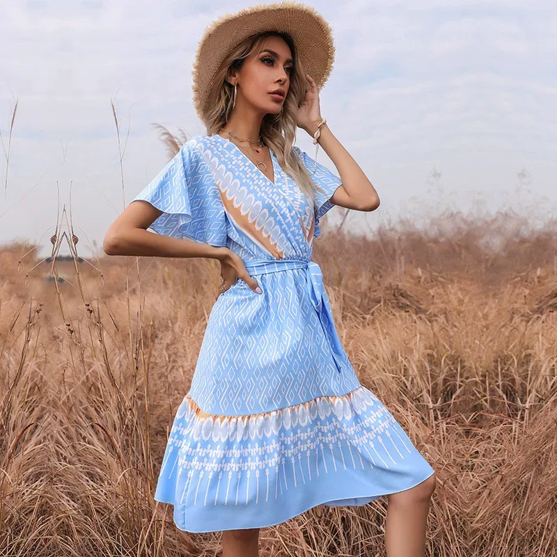 Womens A Line Dress with Tie Detail Short Sleeve V Neck Geometric Print Available in Blue and Pink Wholesale