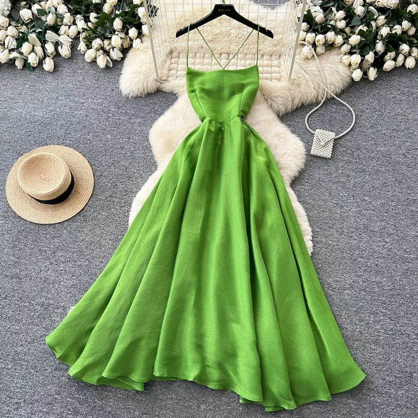 Green Backless Maxi Dress for Women with Waist Cinching Design and Flared Skirt Ideal for Summer Vacations Wholesale Green Backless Maxi Dress for Women with Waist Cinching Design and Flared Skirt Ideal for Summer Vacations Wholesale