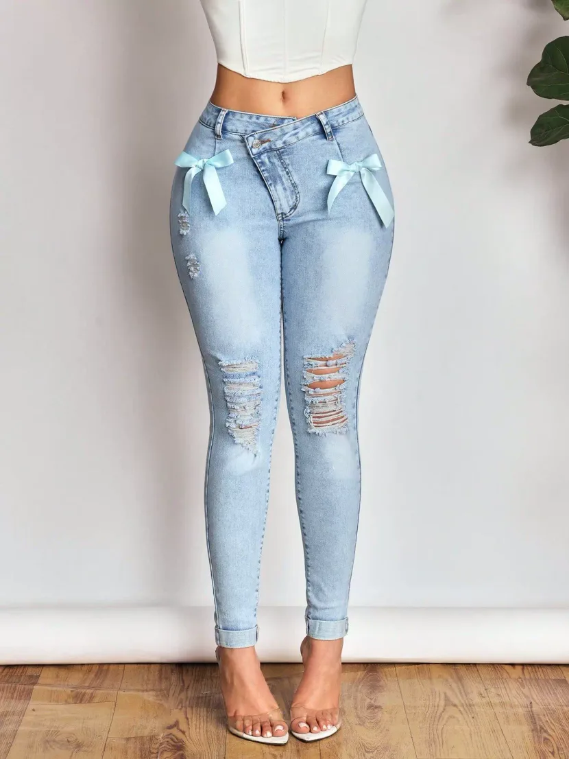 High Elasticity Womens Denim Pants Slim Fit Distressed Hem Bow Detail Casual Wear Ready to Ship